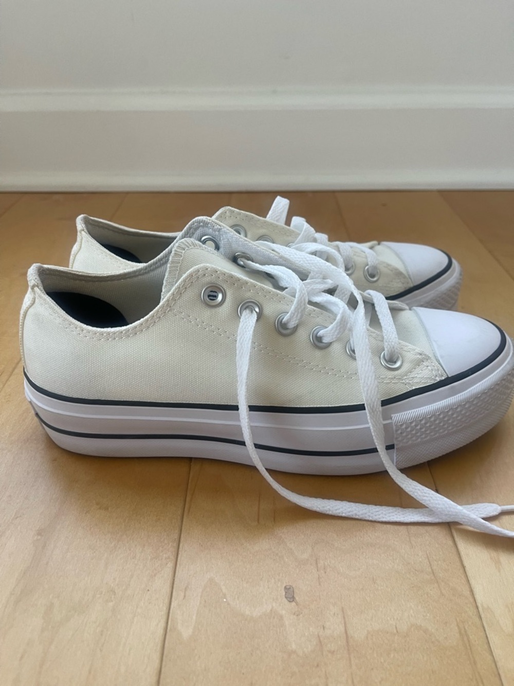 Converse Low Top Platform Canvas Sneakers in pale yellow/ cream color